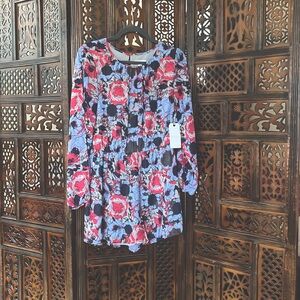 NWT Leith medium blue floral key hole cutout longsleeve romper slit sleeves.
